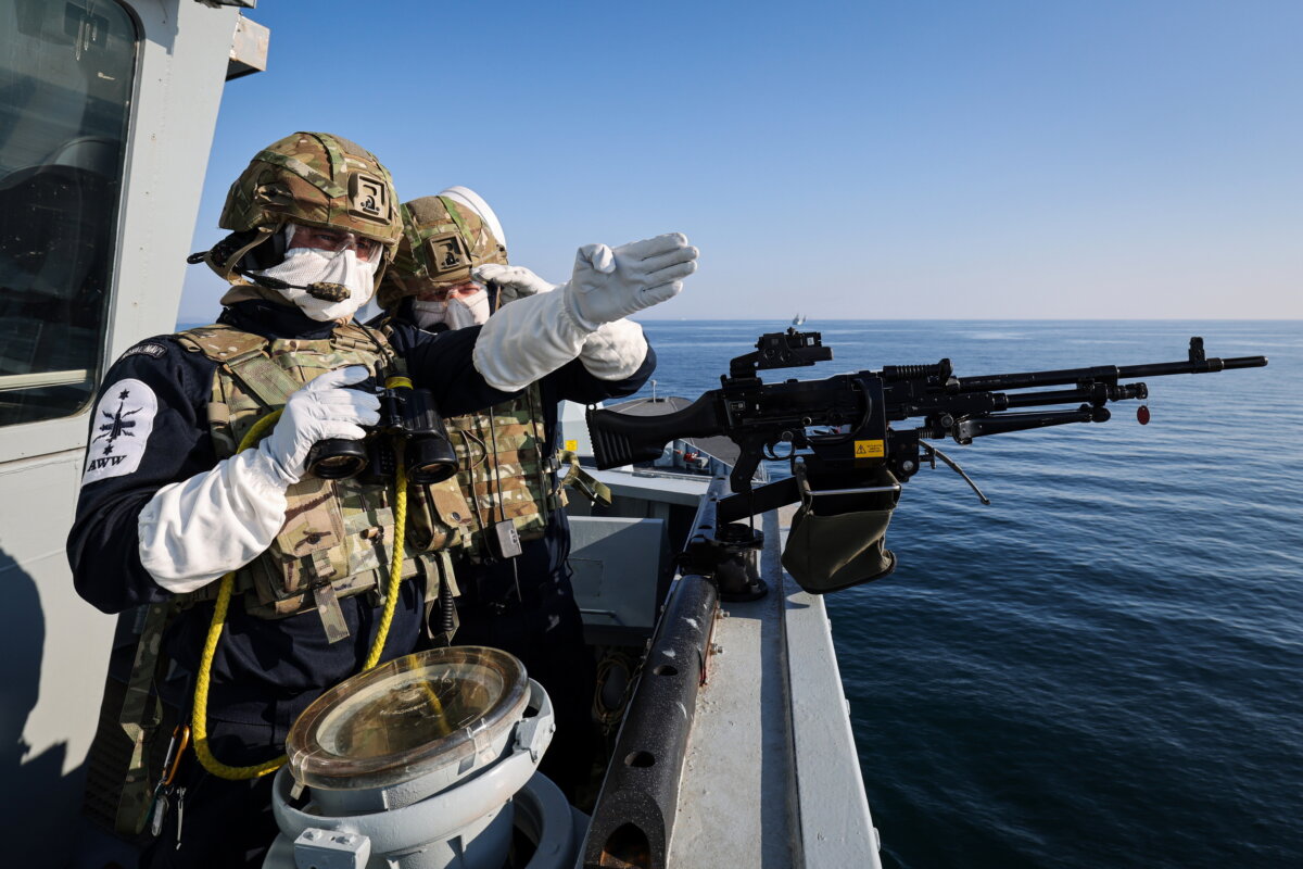 Undated handout photo issued by the Ministry of Defense and Royal Navy of the HMS Dragon conducting a small arms firing at sea in the Hebrides Ranges located off the West coast of Scotland, as part of Operation Hercules, on May 16, 2025. (LPhot Oliver Leach/Ministry of Defence/PA)