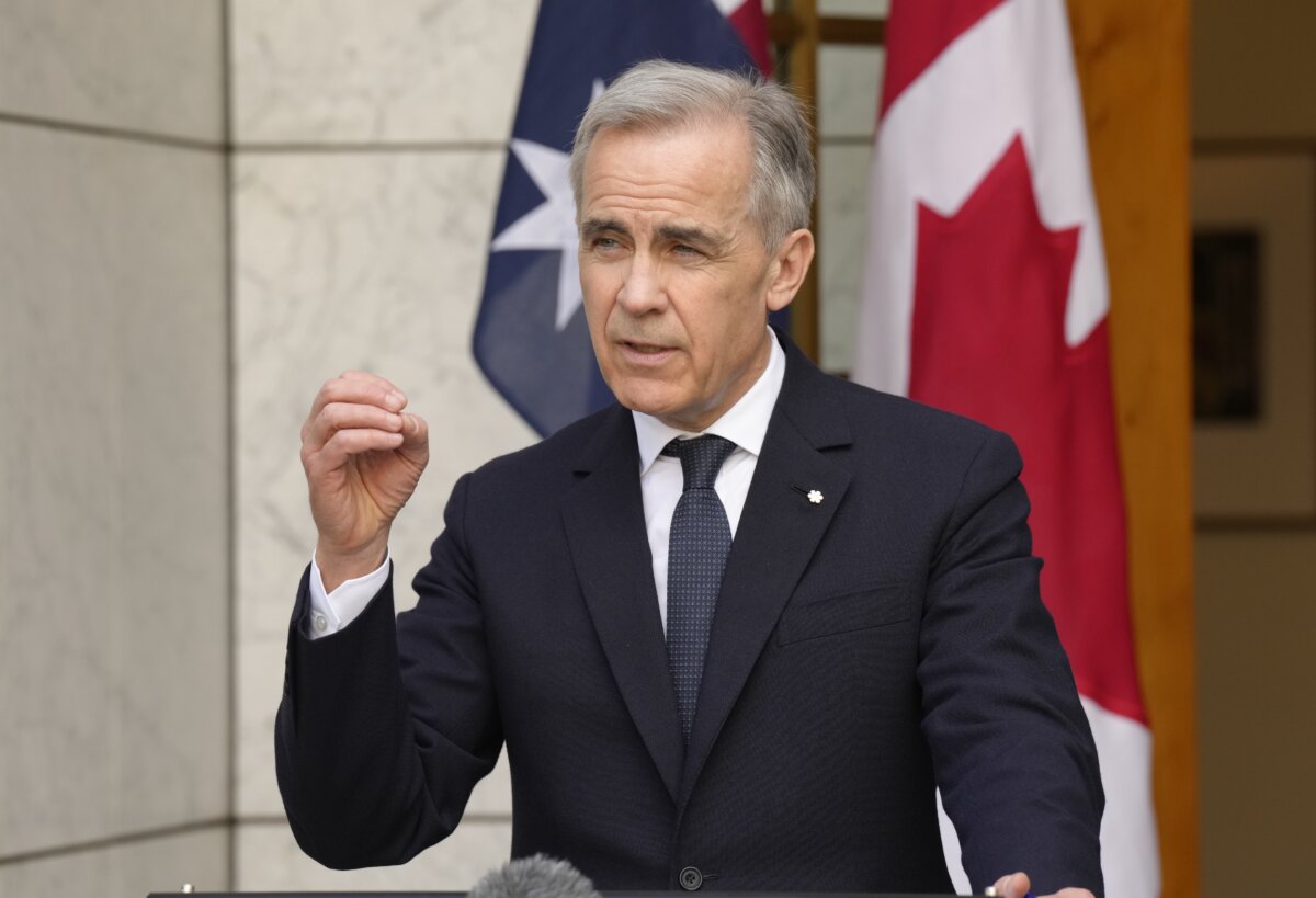 Prime Minister Mark Carney speaks at a news conference in Canberra, Australia, on March 5, 2026. (The Canadian Press/Adrian Wyld)