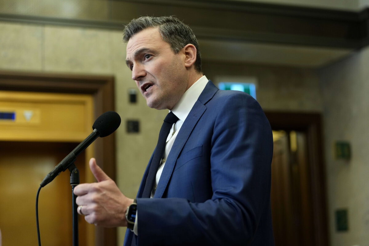 Minister of Artificial Intelligence and Digital Innovation Evan Solomon speaks about interactions with OpenAI regarding the use of ChatGPT by the shooter in the Tumbler Ridge mass shooting, in the Foyer of the House of Commons on Parliament Hill in Ottawa, on Feb. 23, 2026. (The Canadian Press/Justin Tang)