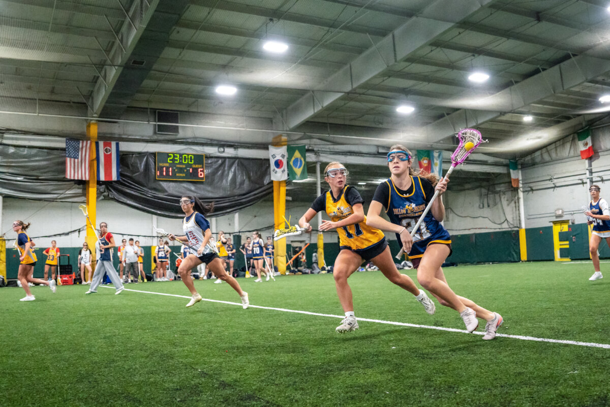 Lacrosse girls' teams 2027 YJ Gaghan-Torre and 2028 YJ Bertolone practice at KK Athletics Indoor Sports in Farmingville, N.Y., on March 1, 2026. (Samira Bouaou/The Epoch Times)