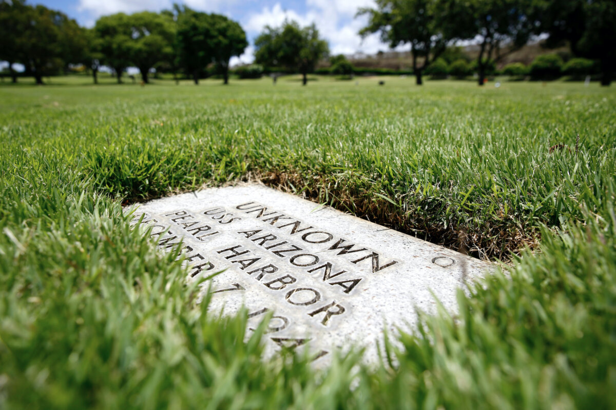 A grave marker for an unknown casualty from the USS Arizona is shown at the National Memorial Cemetery of the Pacific, on July 15, 2021, in Honolulu. (Caleb Jones/AP Photo)