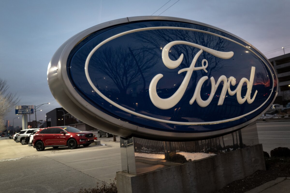 A sign with the Ford logo in front of a dealership in Chicago on Dec. 15, 2025. (Scott Olson/Getty Images)