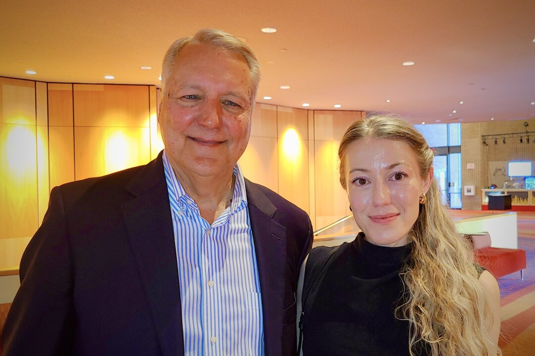 Serena Remy (R) and her father, Doug, enjoyed the first Shen Yun performance of the 2026 season at Symphony Hall in Phoenix, Arizona, on March 5, 2026. (Lily Yu/The Epoch Times)