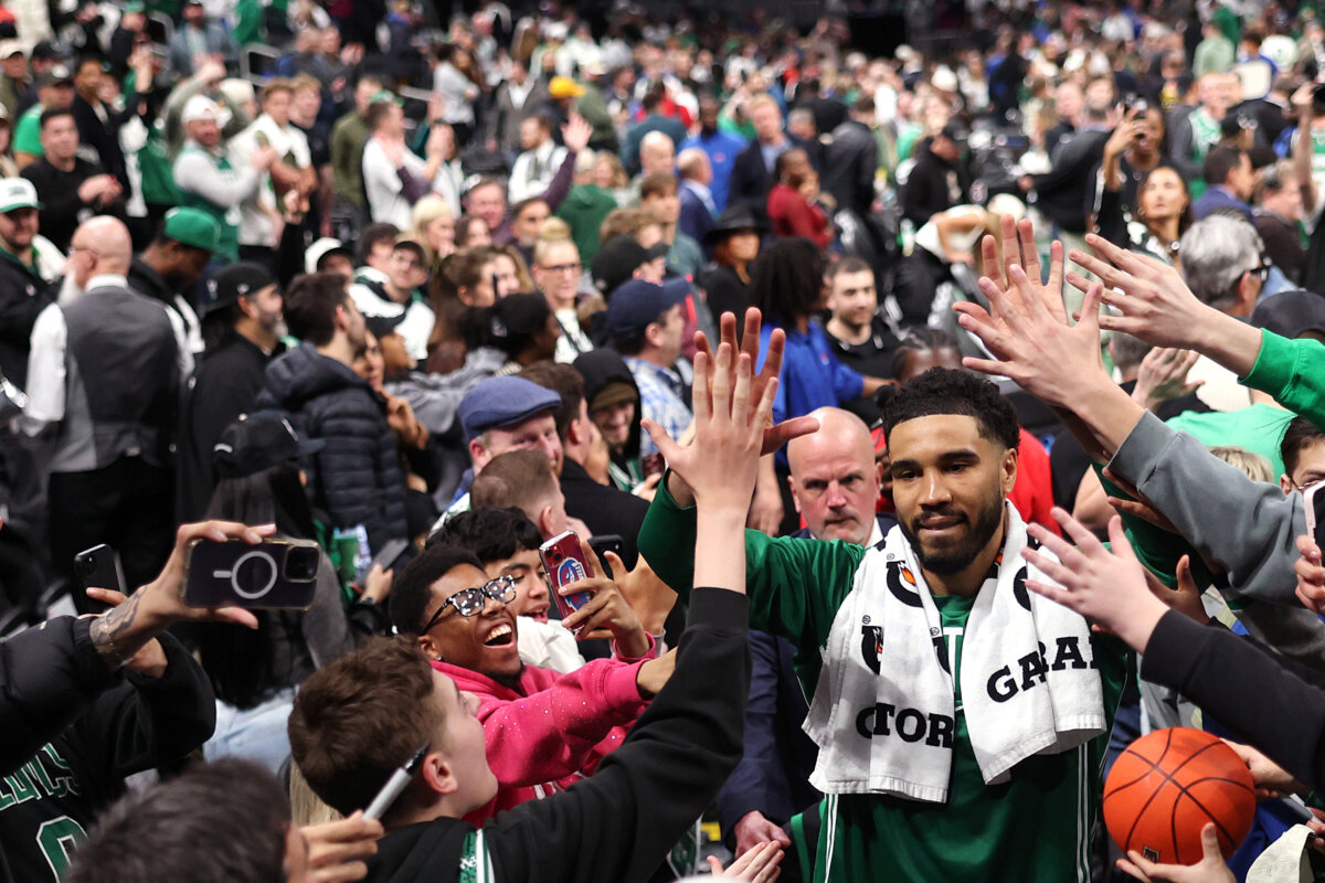Jayson Tatum of the Boston Celtics walks through a crowd of fans to get to the locker room after the Celtics defeat the Dallas Mavericks 120-100 at TD Garden in Boston, Massachusetts. on March 6, 2026. (Maddie Meyer/Getty Images)