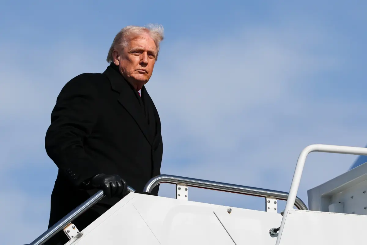 President Donald Trump boards Air Force One at Joint Base Andrews, Md., on Jan. 27, 2026. (Win McNamee/Getty Images)