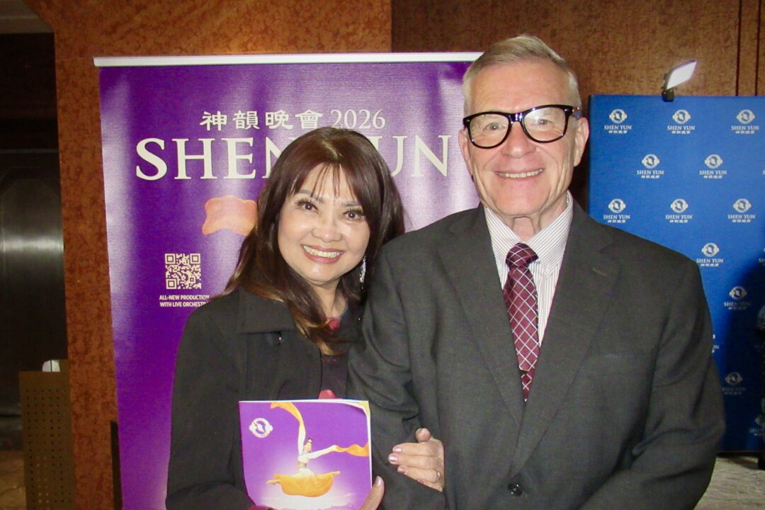 Gary Pulliam and Quinn Vu saw Shen Yun Performing Arts at The Smith Center for the Performing Arts on March 6, 2026. (Linda Jiang/The Epoch Times)