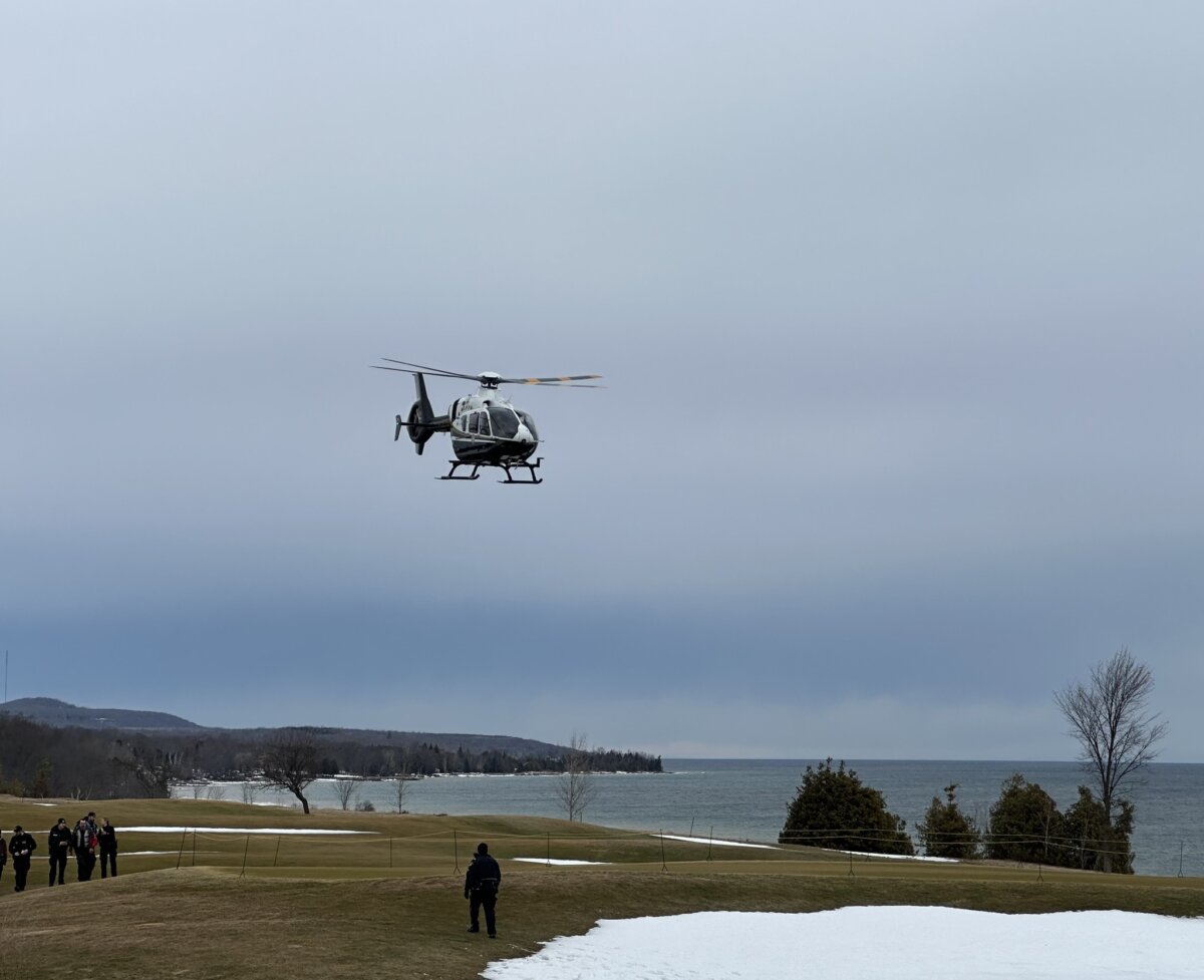 Two Ontario Provincial Police helicopters successfully evacuated and transported 23 people to safety after the ice shelf they were standing on drifted out into Georgian Bay, near Owen Sound, Ont. (Ontario Provincial Police photo)
