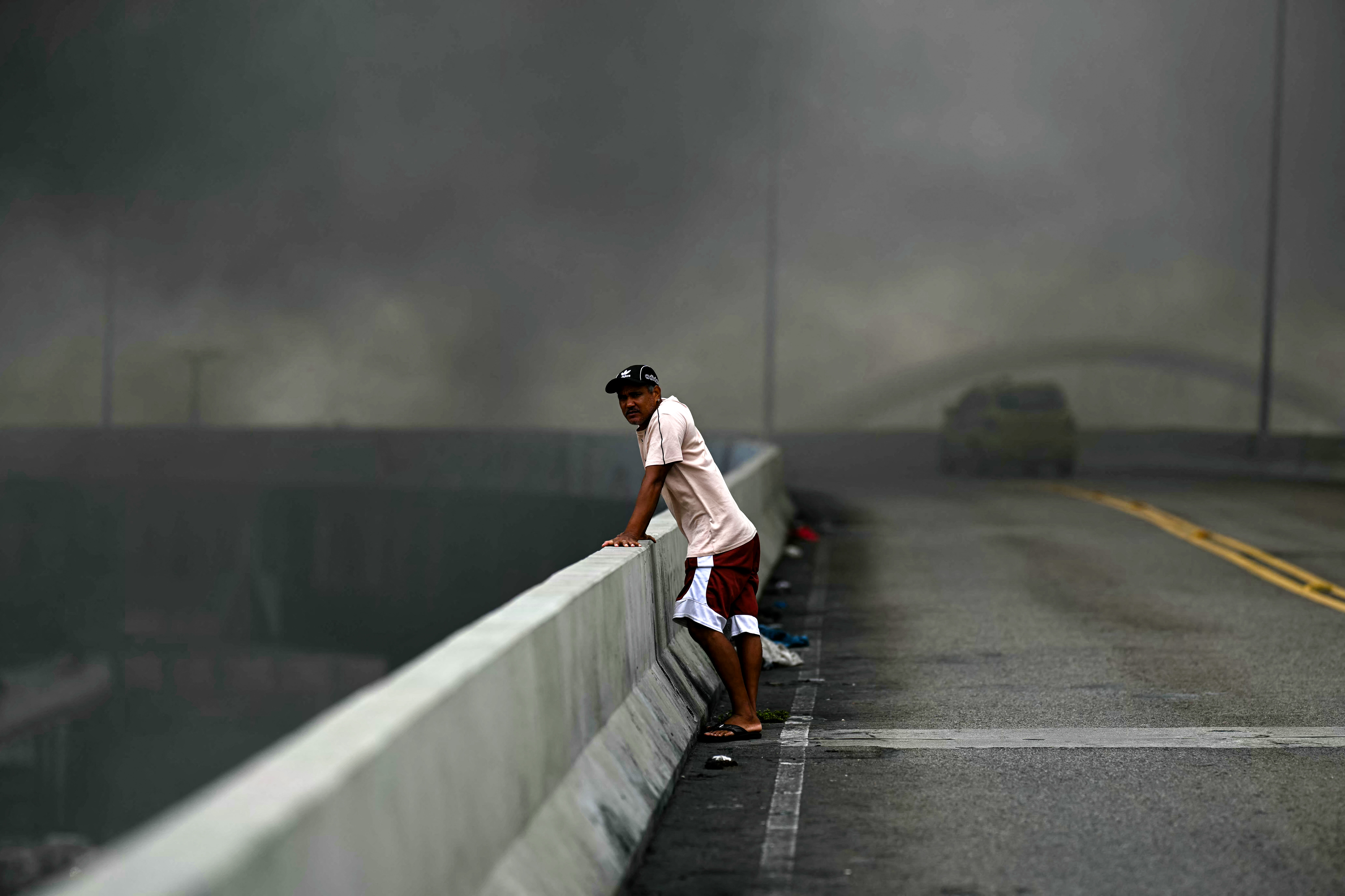 Day in Photos: Fire in Brazil, New York Police Graduates, and Landslide at Landfill in Indonesia