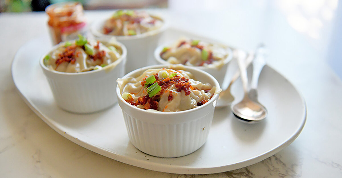 Dumpling lasagna is made with wonton wrappers and seasoned pork instead of pasta, cheese and red sauce. (Gretchen McKay/Pittsburgh Post-Gazette/TNS)