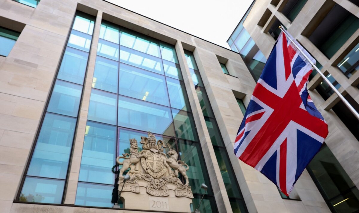 A British flag flies outside Westminster Magistrates' Court in London on Nov. 4, 2025. (Hannah McKay/Reuters)