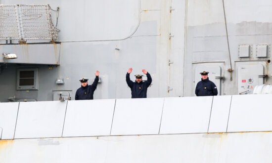 Day in Photos: British Destroyer Heads to Cyprus, Barge Fire in Delaware, and Removing German Sea Mines