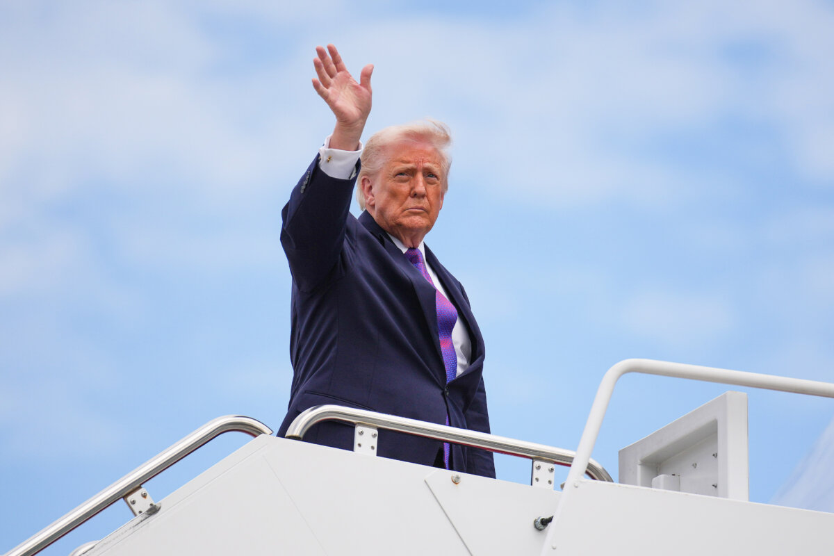 President Donald Trump waves as he boards Air Force One at Joint Base Andrews, Md., on March 11, 2026. President Trump is traveling to Ohio and Kentucky today to highlight two local businesses. (Andrew Harnik/Getty Images)