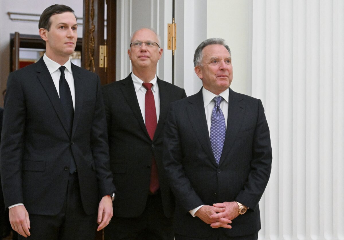 U.S. special envoy Steve Witkoff (R) and U.S. President Donald Trump's son-in-law Jared Kushner (L), accompanied by Kremlin economic envoy Kirill Dmitriev (M), are seen prior to a meeting with Russia's President at the Kremlin in Moscow on Dec. 2, 2025. (Kristina Kormilitsyna/AFP via Getty Images)