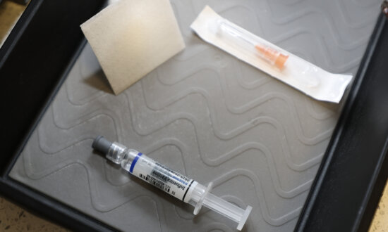 Woman Whose Children Died After Vaccinations Charged With Murder