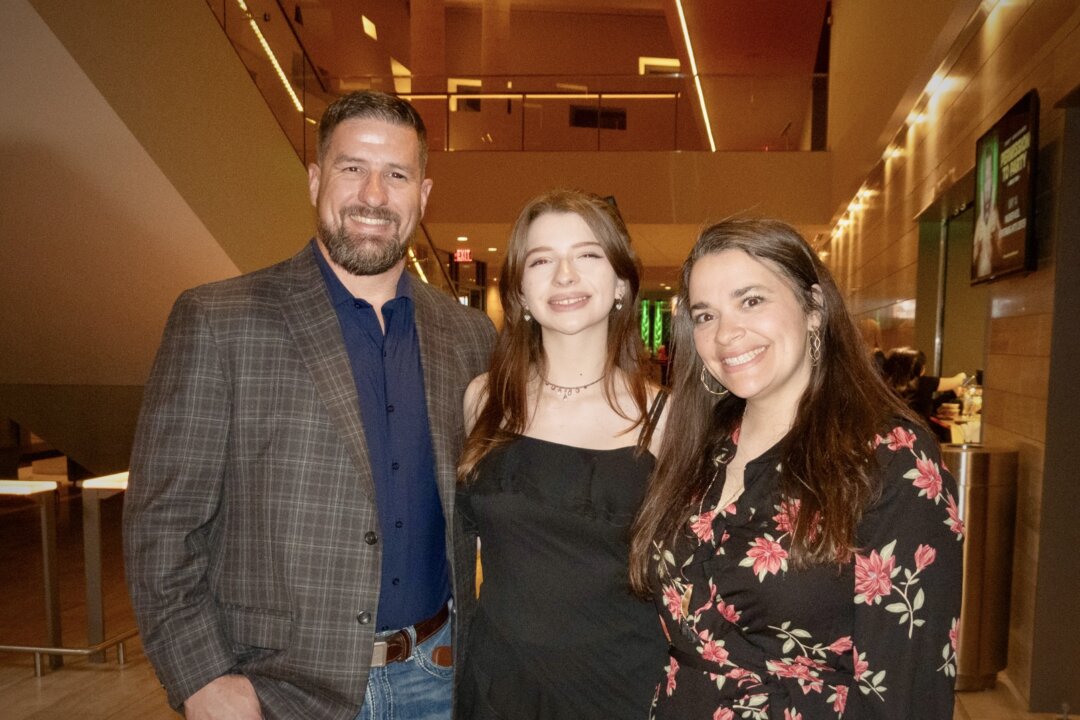 Raymond King with his wife, Amber King, and their daughter, Valerie, attended the Shen Yun North American Company performance at the Wagner Noël Performing Arts Center in Midland, Texas, on March 11, 2026. (Jane Yang/The Epoch Times)