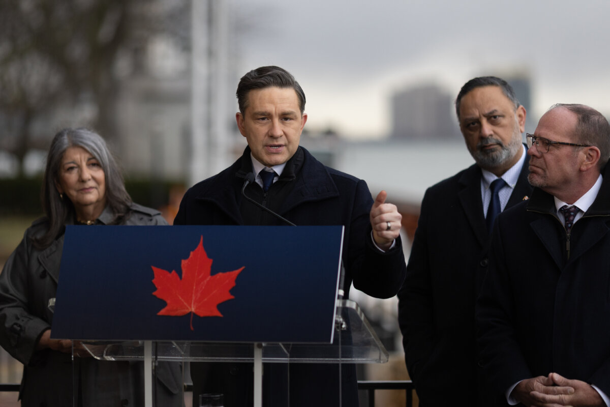 Conservative Leader Pierre Poilievre (C) is joined by local Members of Parliament (L–R) Kathy Borrelli, Harb Gill, and Chris Lewis during a press conference outside the Windsor Club in Windsor, Ont., on March 13, 2026. (The Canadian Press/Dax Melmer)