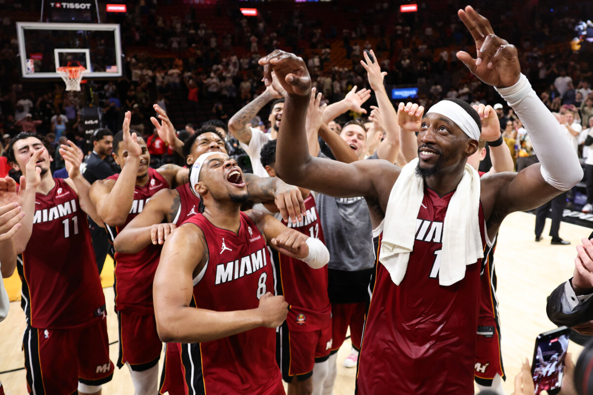Bam Adebayo (R) of the Miami Heat celebrates with teammates after defeating the Washington Wizards at Kaseya Center in Miami on March 10, 2026. Adebayo passed Kobe Bryant for the second most points scored in an NBA game with 83 in the 150–129 win. (Megan Briggs/Getty Images)