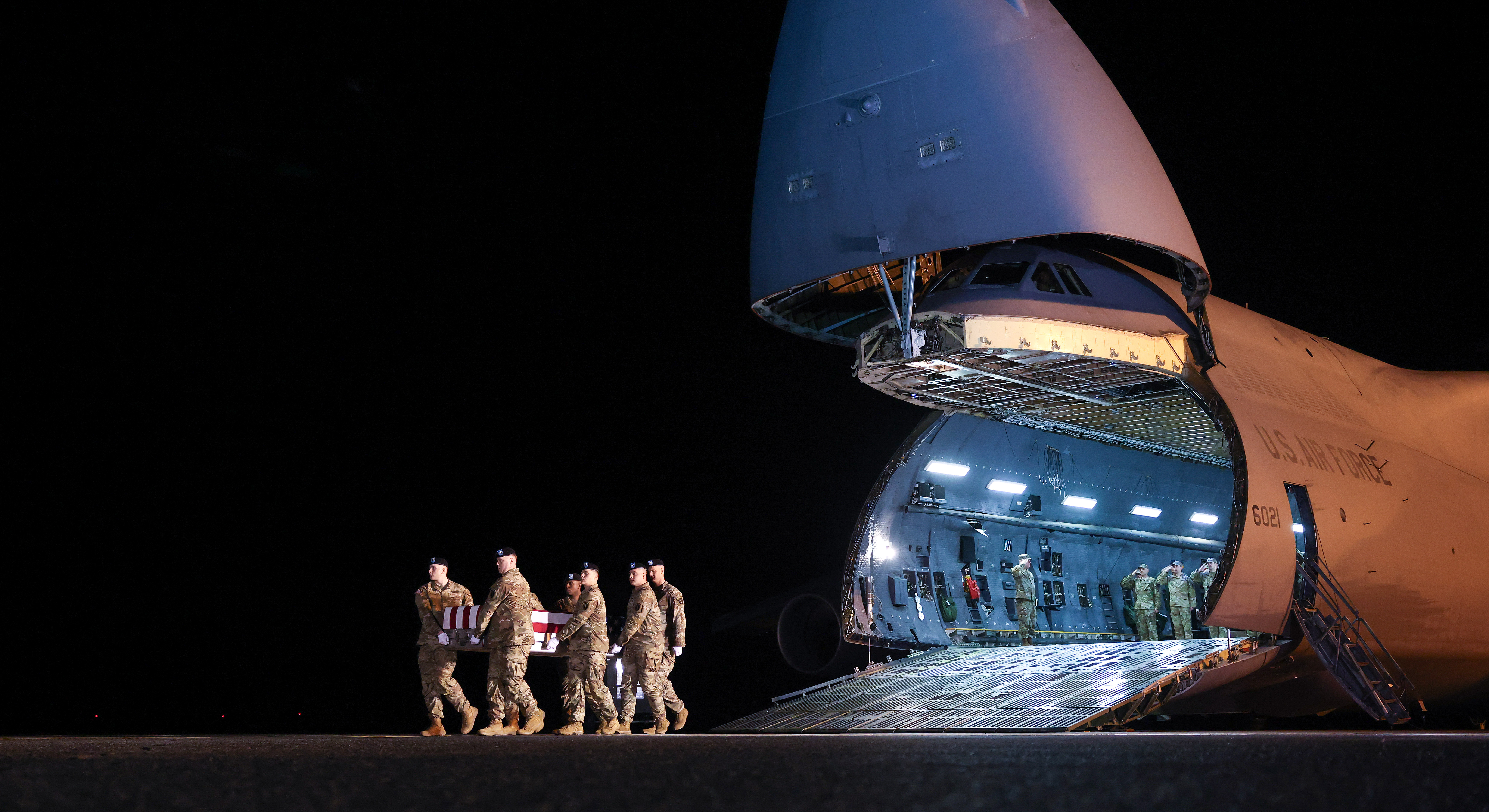 America in Photos: Dignified Transfer, Midwest Tornadoes, and National Tulip Day