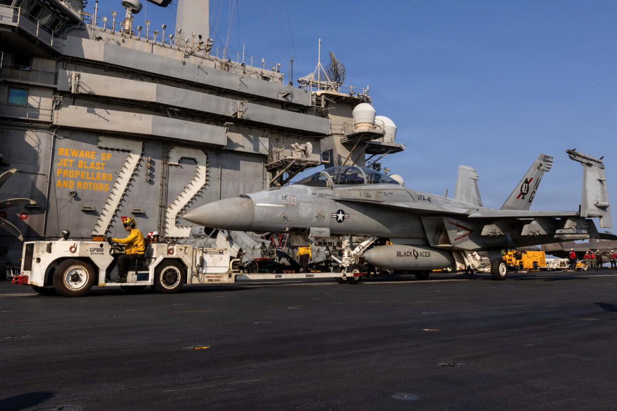 An F/A-18F Super Hornet, attached to Strike Fighter Squadron (VFA) 41, is taxied on the flight deck of Nimitz-class aircraft carrier USS Abraham Lincoln (CVN 72) in support of Operation Epic Fury, in the Mediterranean Sea, on March 6, 2026. (U.S. Navy via Getty Images)