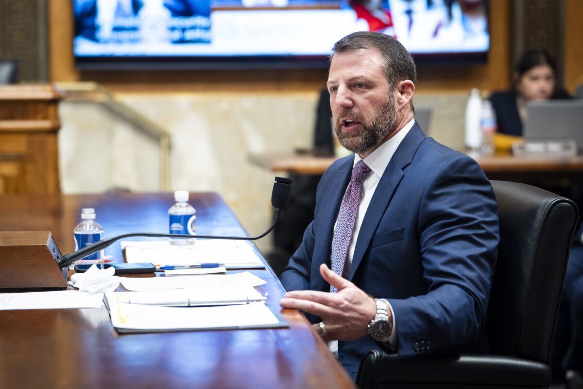 Sen. Markwayne Mullin (R-Okla.) testifies during his confirmation hearing to lead the Department of Homeland Security on Capitol Hill in Washington on March 18, 2026. (Madalina Kilroy/The Epoch Times)