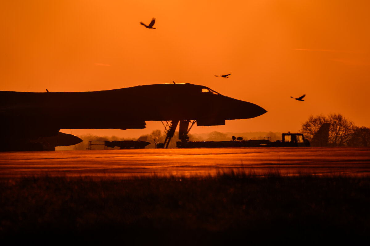 A Rockwell B-1 Lancer heavy bomber sits on the tarmac during sunrise at RAF Fairford in England on March 19, 2026. Since UK Prime Minister Keir Starmer backtracked on his initial refusal to allow the United States to use British bases to launch strikes against Iranian missile sites, a variety of U.S. military aircraft, including B-52 and B-1 bombers, have been spotted at RAF Fairford. (Leon Neal/Getty Images)