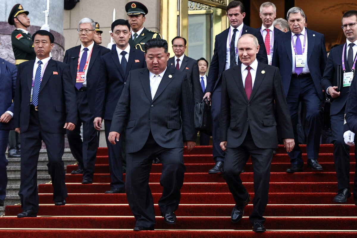 In this pool photograph distributed by the Russian state agency Sputnik, Russia's President Vladimir Putin (centre R) and North Korea's leader Kim Jong Un (centre L) leave after their meeting in Beijing on Sept. 3, 2025. (Alexander Kazakov / POOL / AFP via Getty Images)