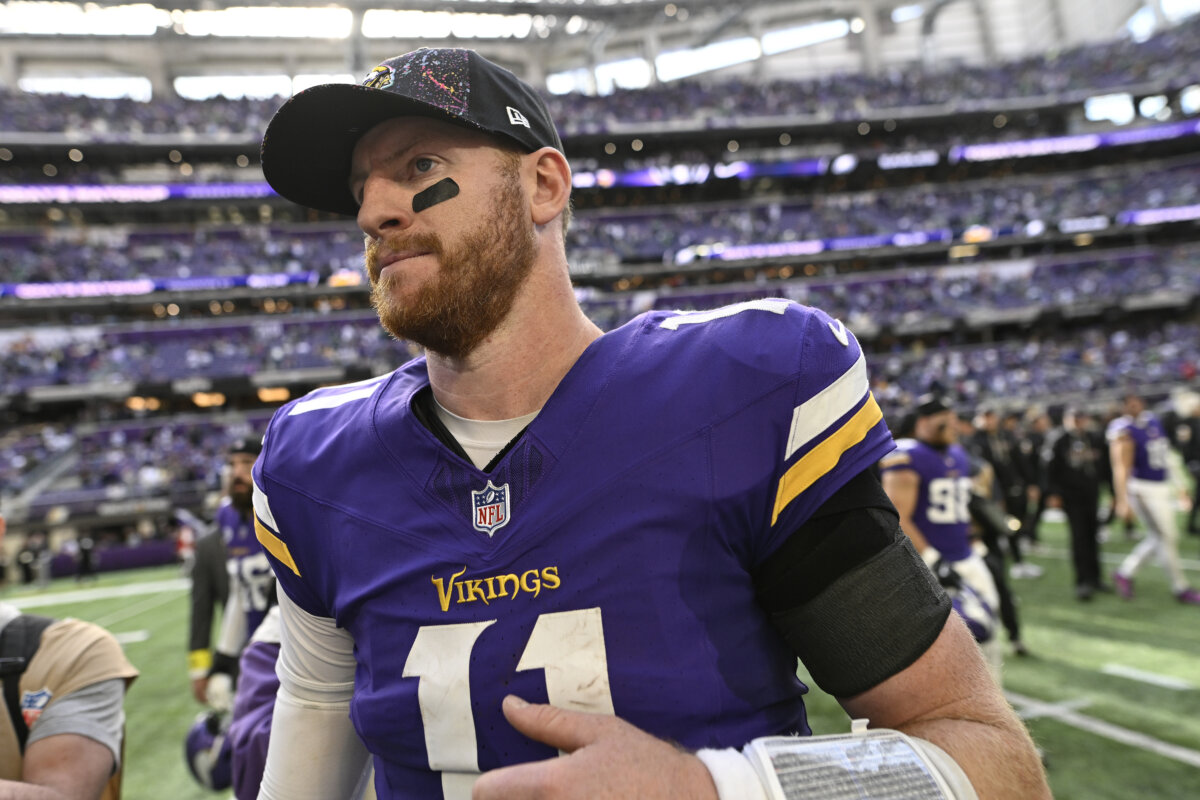 Carson Wentz, No. 11 of the Minnesota Vikings, reacts after a 28-22 loss against the Philadelphia Eagles in the game at U.S. Bank Stadium in Minneapolis, Minnesota, on Oct. 19, 2025. (Stephen Maturen/Getty Images)