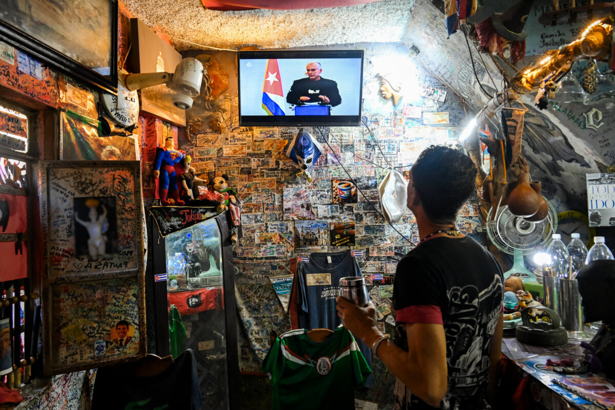 A man watches a broadcast of Cuban leader Miguel Díaz-Canel speaking on national television, in Havana on Feb. 5, 2026. (Yamil Lage/AFP via Getty Images)