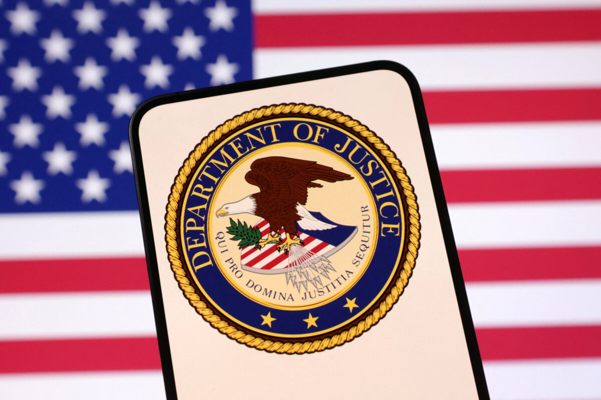United States Department of Justice logo and U.S. flag are seen in this illustration taken April 23, 2025. (Dado Ruvic/Illustration/Reuters)