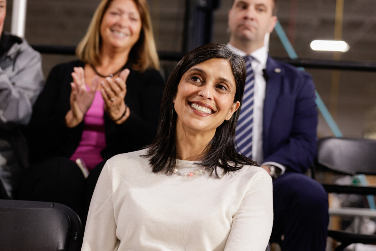 Second Lady Usha Vance listens to her husband, Vice President JD Vance, speak during a visit to the Engineering Design Services Inc. manufacturing facility in Auburn Hills, Mich., on March 18, 2026. (Jeff Kowalsky/AFP via Getty Images)
