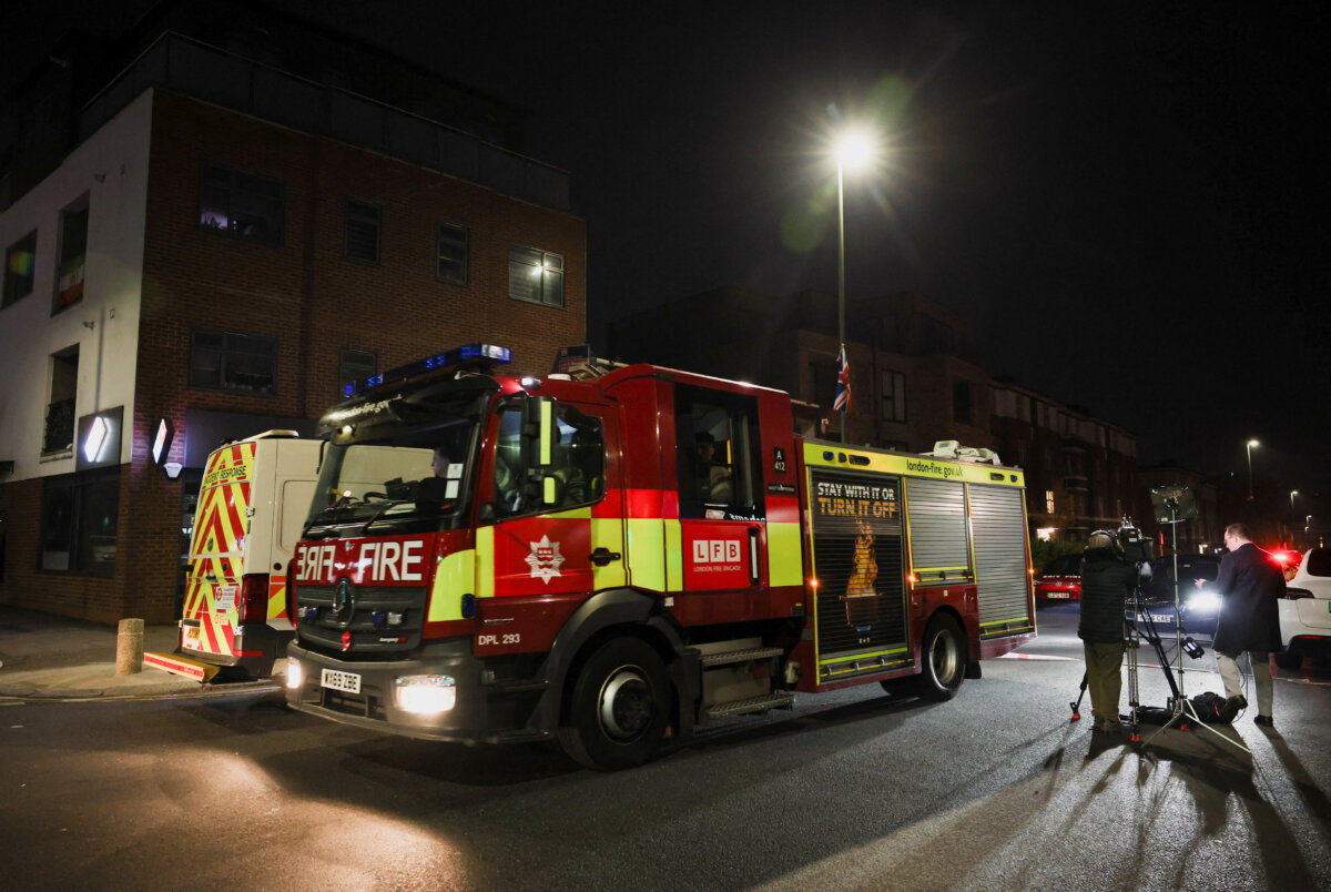 A fire engine leaves the scene after four ambulances belonging to Hatzalah, a Jewish community organization, were set on fire in an incident that the police say is being treated as an anti-Semitic hate crime, in northwest London on March 23, 2026. (Isabel Infantes/Reuters)