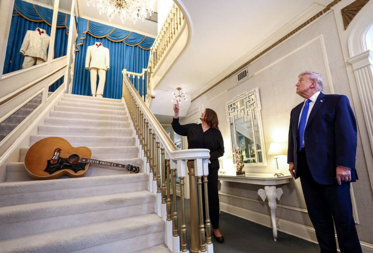 President Donald Trump visits Graceland, the home of Elvis Presley, in Memphis, Tenn., on March 23, 2026. Also seen in the image is Graceland estate’s archivist, Angie Marchese. (Kevin Lamarque/Reuters)