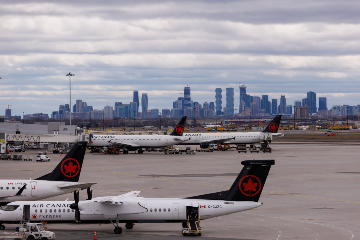 Air Canada planes are seen at Pearson International Airport in Toronto on March 31, 2025. (Cole Burston/Getty Images)