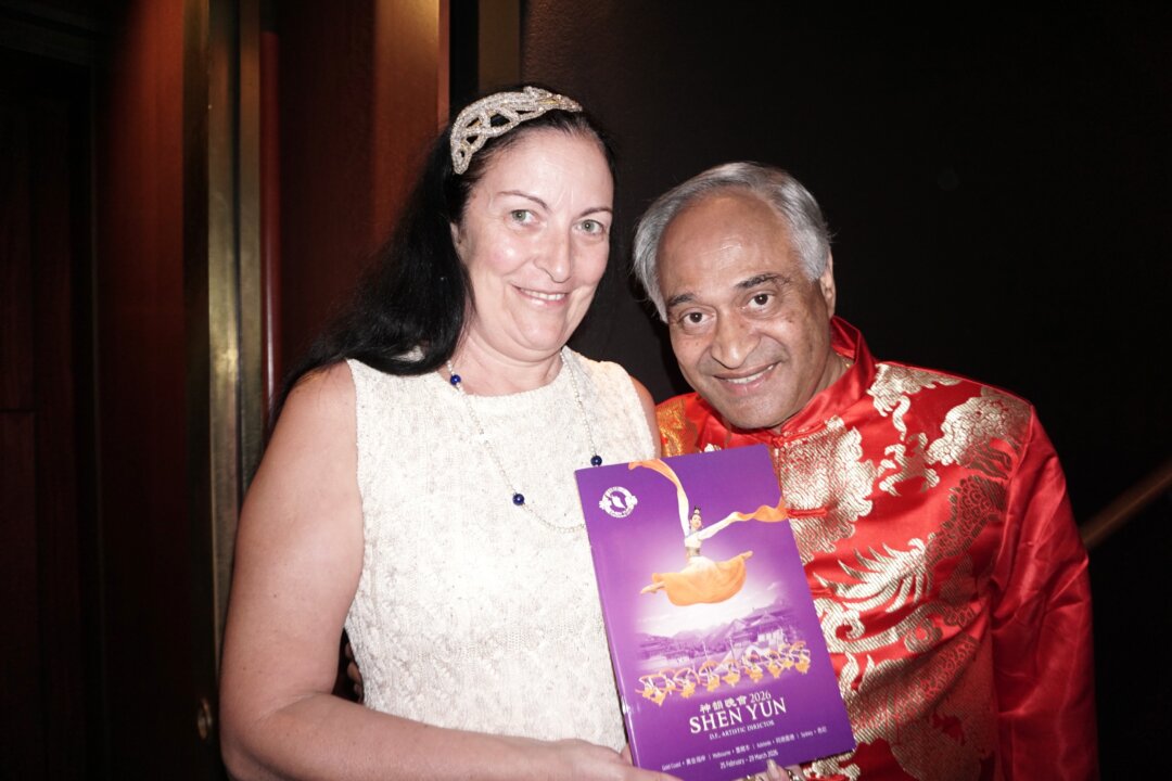 Noel D'Souza and his wife enjoy Shen Yun Performing Arts at the Sydney Lyrics in Australia on March 24, 2026. (Julia Ye/The Epoch Times)