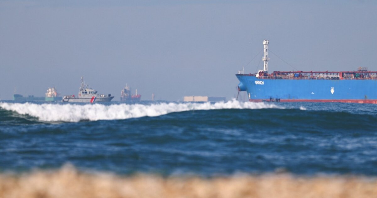 A French navy boat monitors the alleged shadow fleet oil tanker Grinch, in the Gulf of Fos-sur-Mer, near Martigues, France, on Jan. 25, 2026. (Manon Cruz/Reuters)