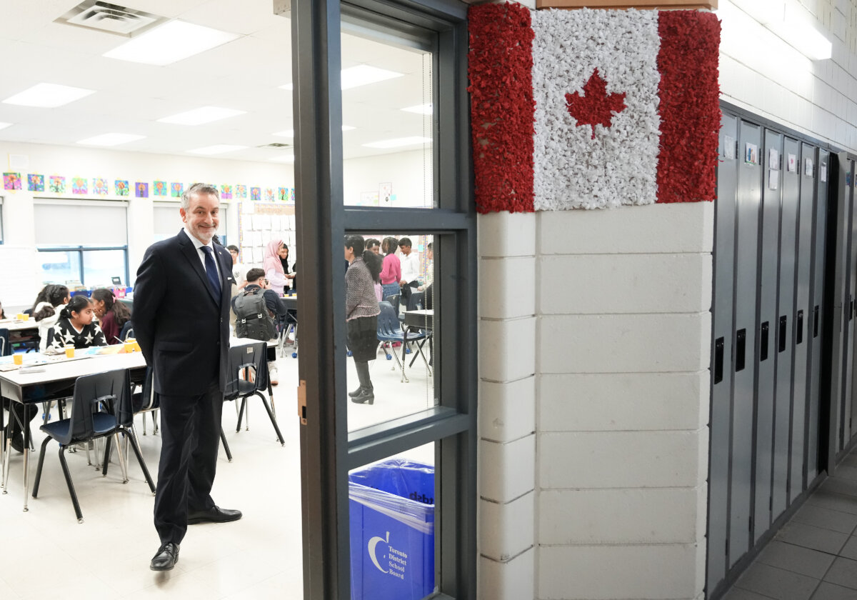 Paul Calandra, Ontario's minister of education, visits students at Highfield Junior Public School in Toronto on March 11, 2026. (The Canadian Press/Nathan Denette)