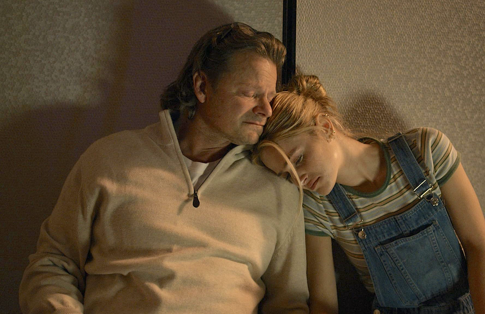 Claire (Audrey Zahn) and dad, Jason (Steve Zahn), talk in a motel room, in "She Dances." (Macaroni Art Productions/EKKL Entertainment)