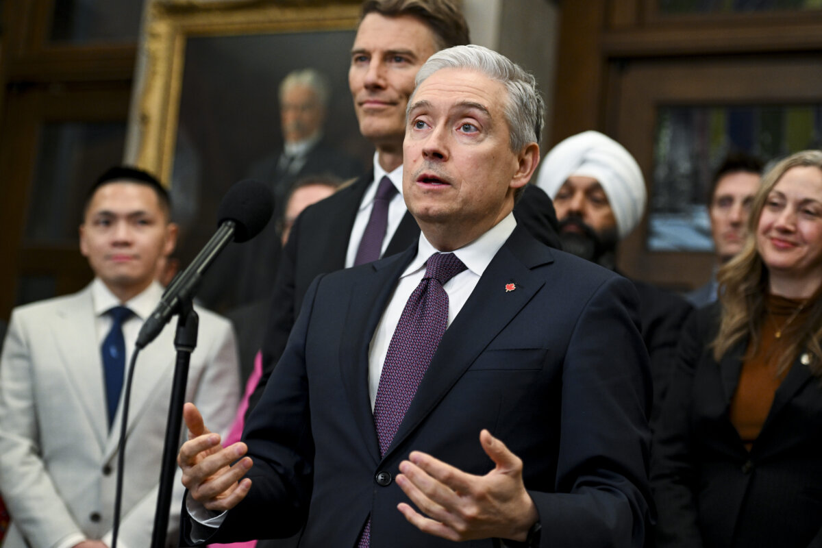 Minister of Finance and National Revenue François-Philippe Champagne speaks in the foyer of the House of Commons on Parliament Hill in Ottawa, on March 26, 2026. (Spencer Colby/The Canadian Press)