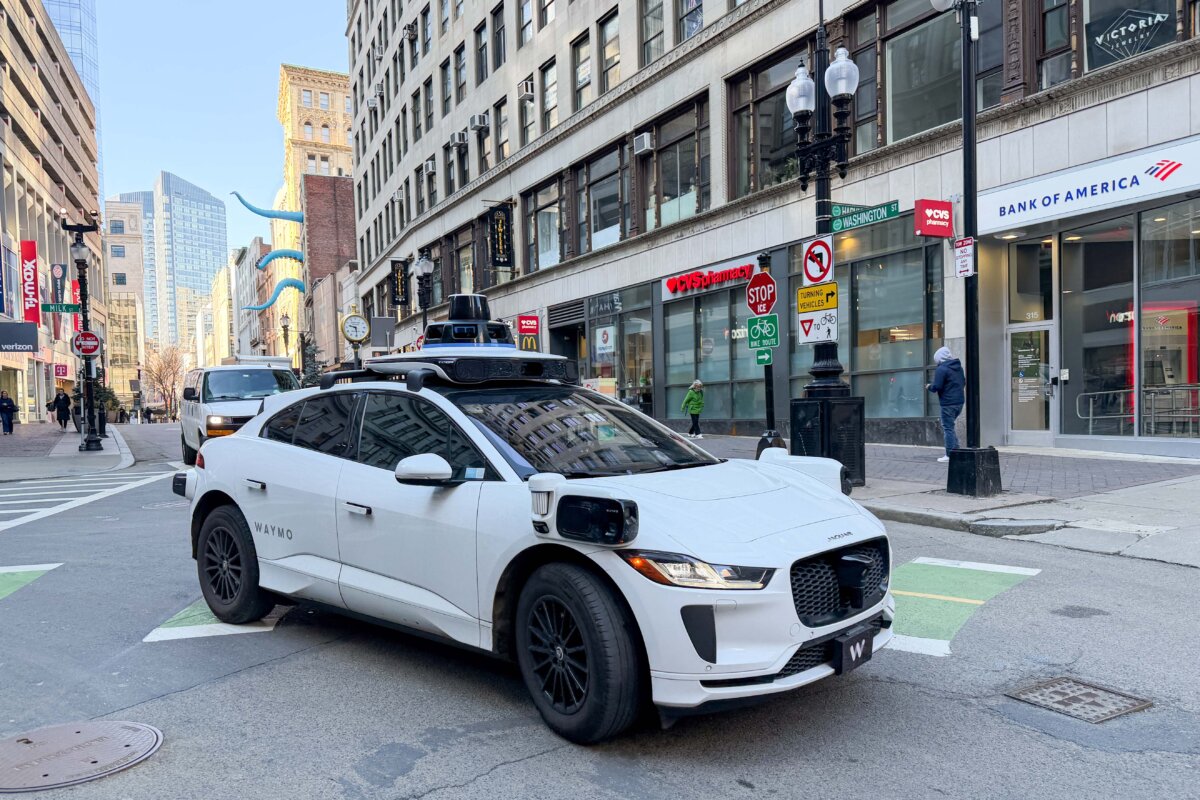 A self-driving Waymo vehicle runs in Boston, Mass., on March 13, 2026. (Learner Liu/The Epoch Times)