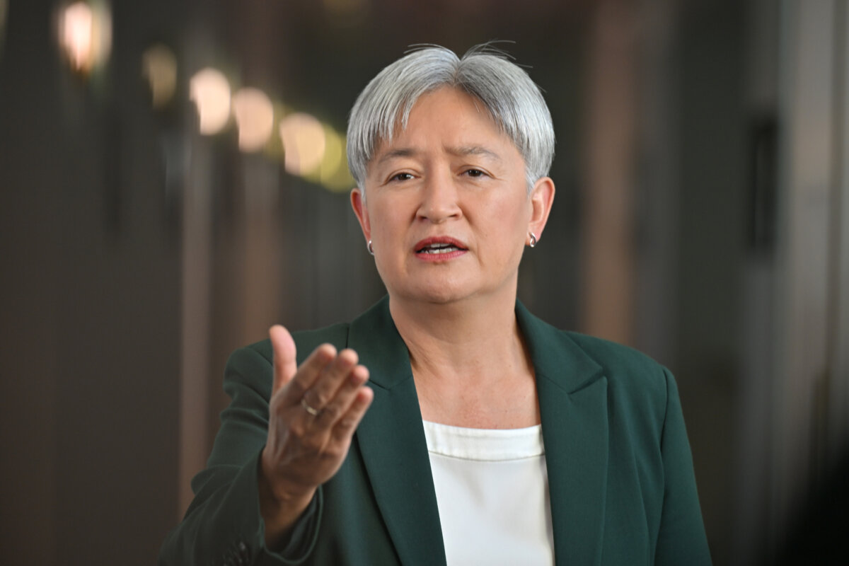 Minister for Foreign Affairs Penny Wong talks to journalists at Parliament House in Canberra, Australia, on March 12, 2026. (AAP Image/Mick Tsikas)