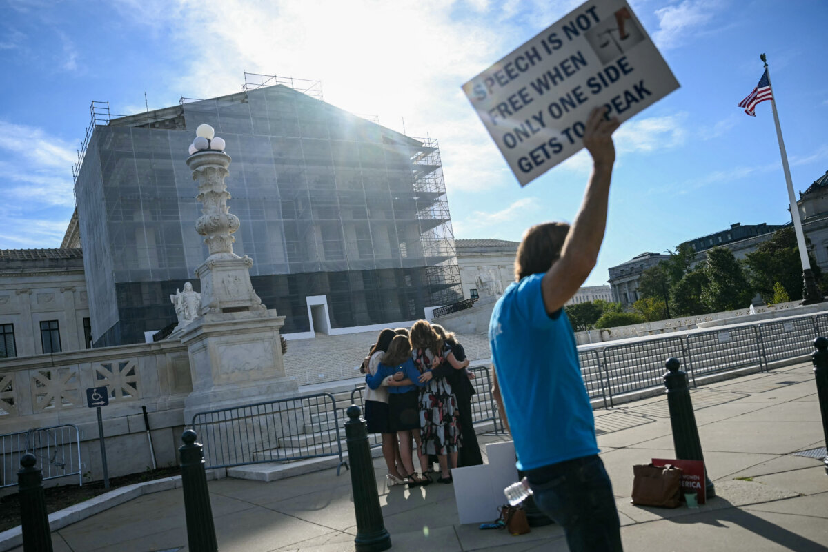 Members of the group "Concerned Women for America" pray outside the U.S. Supreme Court as the Court hears oral arguments in the Chiles v. Salazar case in Washington, on Oct. 7, 2025. (Andrew Caballero-Reynolds/AFP via Getty Images)