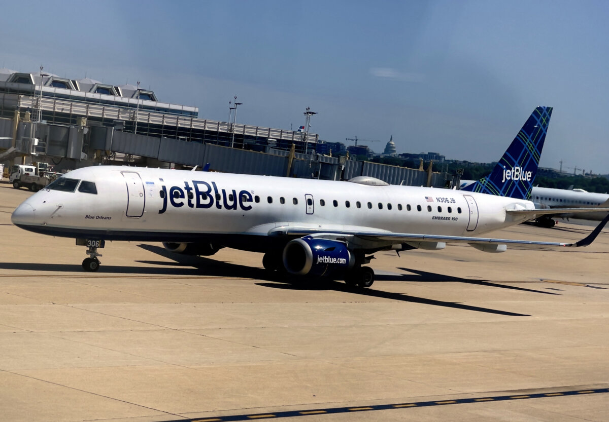 A JetBlue Embraer 190 taxis on the tarmac at Ronald Reagan Washington National Airport in Arlington, Va., on June 29, 2021. (Daniel Slim/AFP via Getty Images)