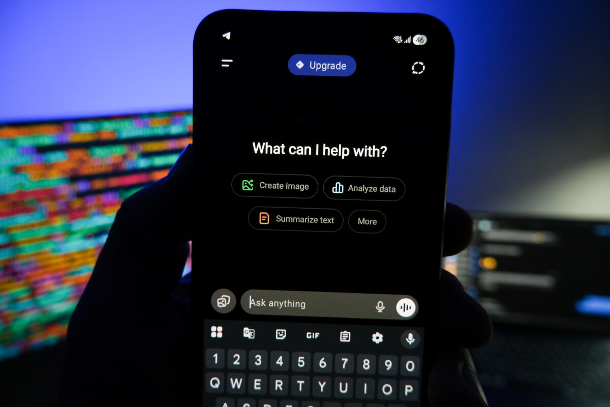 A smartphone screen shows a chatbot app in this photo illustration. (Oleksii Pydsosonnii/The Epoch Times)