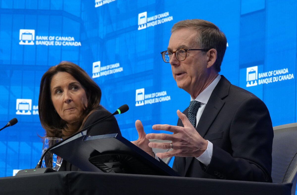 Deputy Governor Carolyn Rogers looks on as Bank of Canada Governor Tiff Macklem is seen during a news conference in Ottawa, on March 18, 2026. (The Canadian Press/Adrian Wyld)
