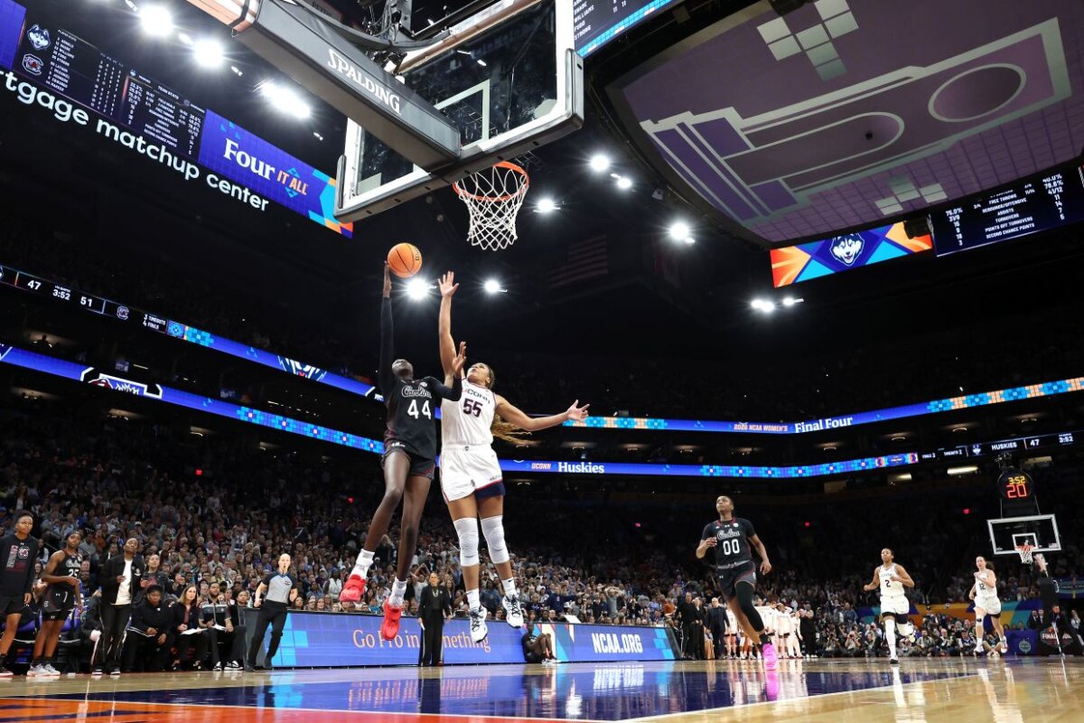 Agot Makeer #44 of the South Carolina Gamecocks shoots the ball against Sarah Strong #55 of the UConn Huskies during the fourth quarter in the Final Four of the NCAA Women's Basketball Tournament at Mortgage Matchup Center in Phoenix, Ariz., on April 3, 2026. (Sarah Stier/Getty Images)
