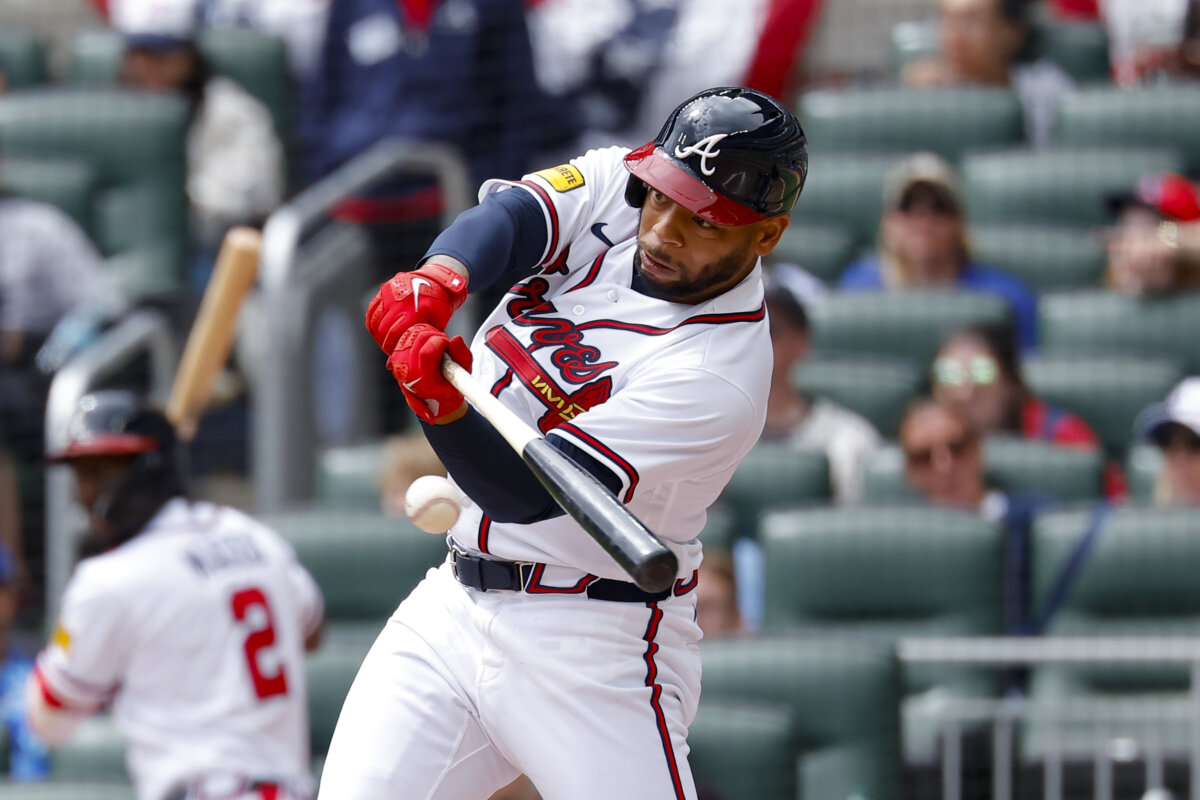 Dominic Smith #8 of the Atlanta Braves hits a single during the fifth inning against the Kansas City Royals at Truist Park in Atlanta, Ga., on March 29, 2026. (Todd Kirkland/Getty Images)