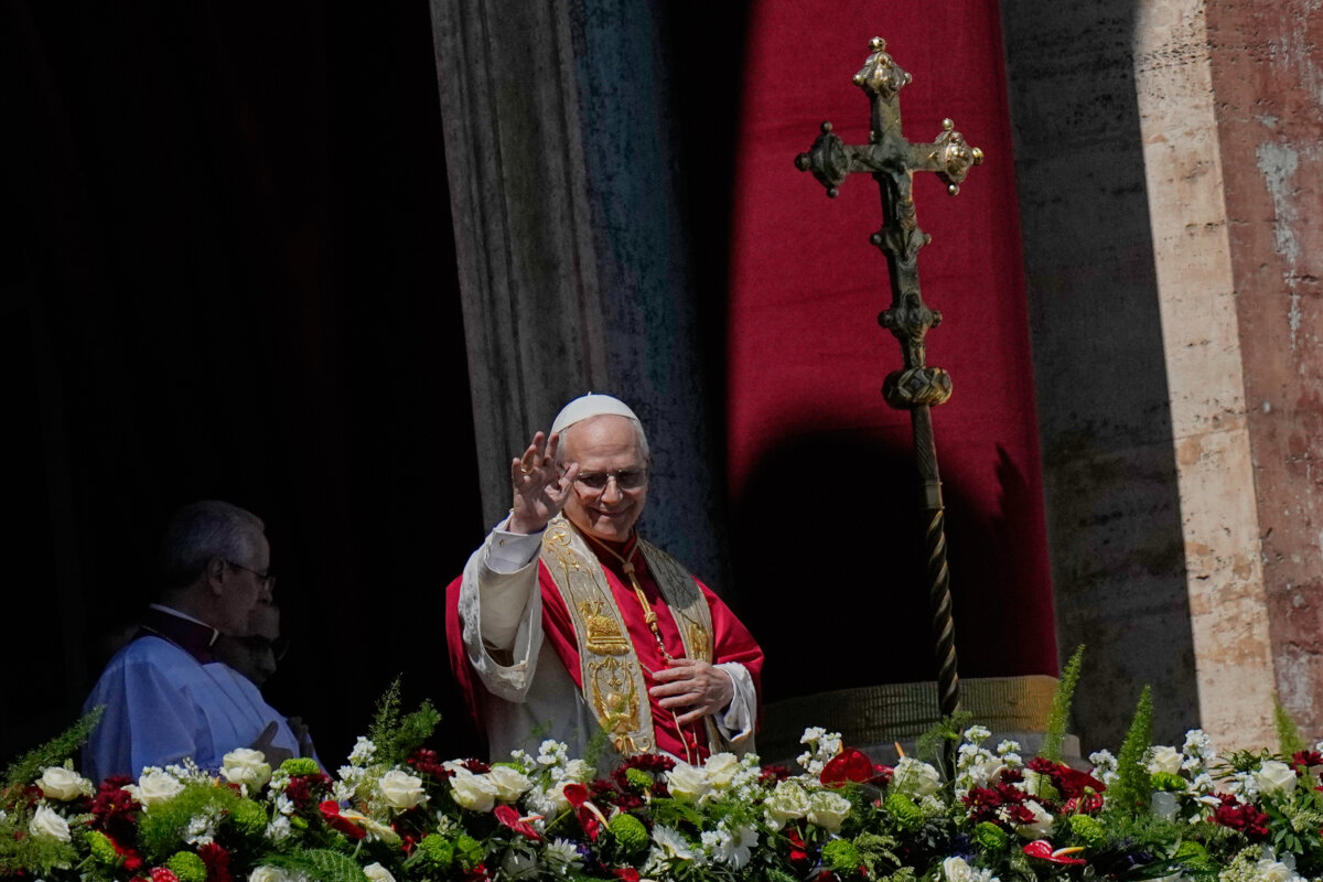 Pope Leo XIV addresses the faithful after delivering a blessing from the central loggia of St. Peter's Basilica at the end of Easter Mass in St. Peter's Square at the Vatican on April 5, 2026. (Alessandra Tarantino/AP Photo)