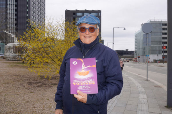 Clinic owner and clinical psychologist Michael Gjereo enjoys Shen Yun Performing Arts at the Royal Arena in Copenhagen, Denmark, on April 2, 2026. (Mary Man/The Epoch Times)