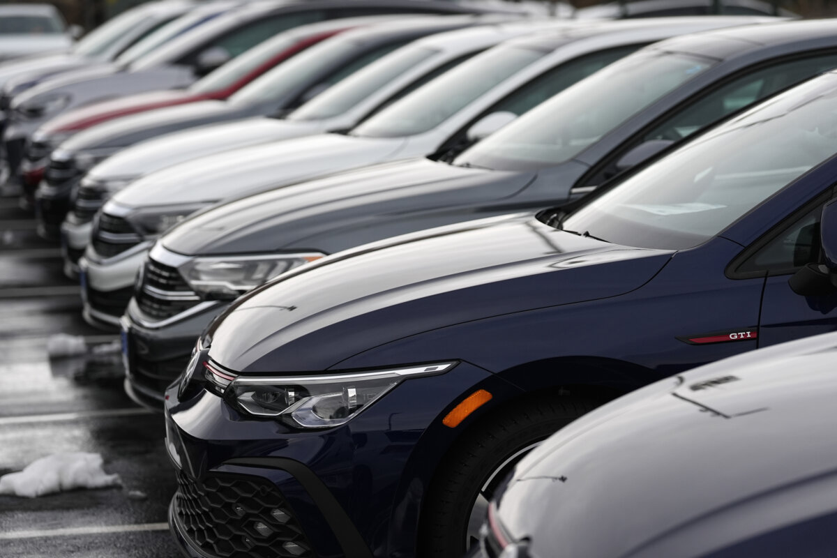 A line of GTI and Jetta sedans sit at a Volkswagen dealership, March 17, 2024, in Denver, Colorado. (AP Photo/David Zalubowski)