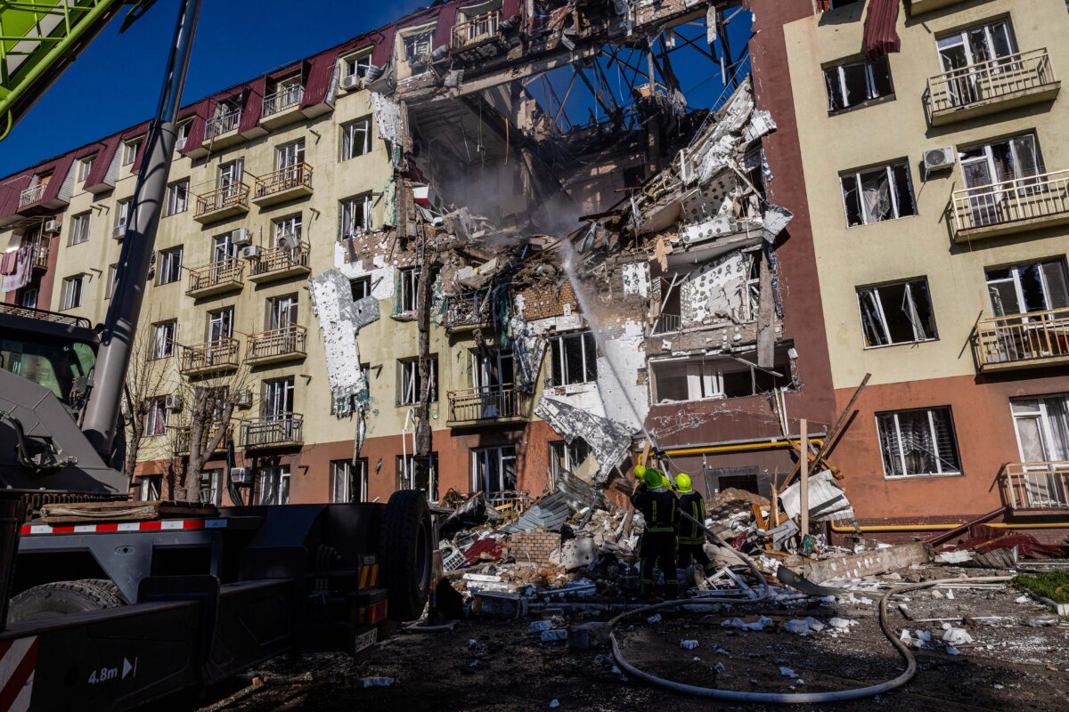 Ukrainian rescuers work at a site of a heavily damaged residential building following a massive strike in Odesa, Ukraine, on April 6, 2026. (Oleksandr Gimanov / AFP via Getty Images)